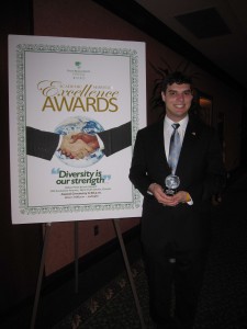 Evan Baumel receiving Award of Excellence Evan Baumel