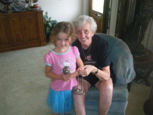 shirleyathome My daughter and my Aunt Shirley, holding a Tibetan prayer wheel and bell in Shirley's home