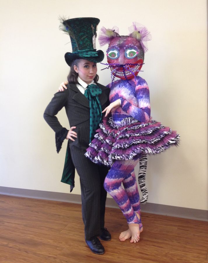 Emma Parssi (Wellington) as the tap-dancing Mad Hatter and Sydney Sheldon (WPB) as the Cheshire Cat